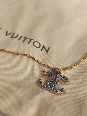 Chanel Unbranded Necklace With Louis Vuitton Dust Cover